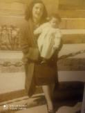 Yo ,Mara Dolores con mi hermana Carmen que me tiene en brazos a la edad de 3 meses en los hroes de cavite en el ao 1953